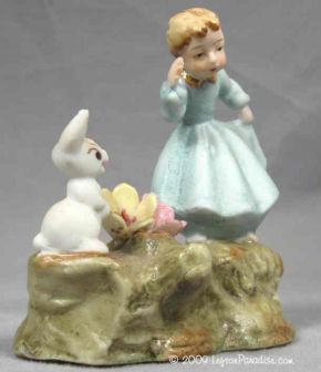 Young Girl with Bunny and Flower
